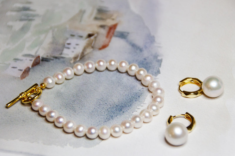 lady perfect örhängen och planeta armband set